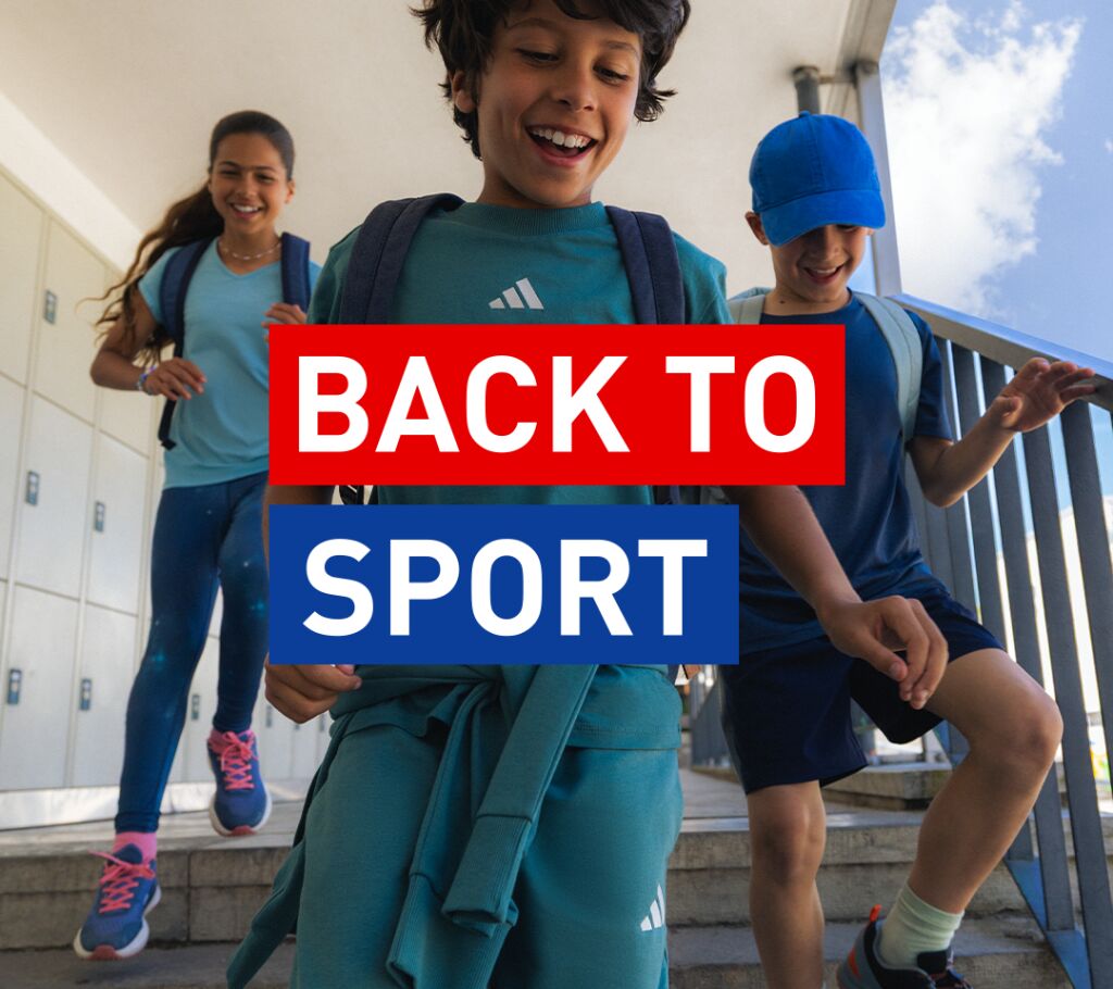 Back to Sport kolme lasta juoksee portaita alas