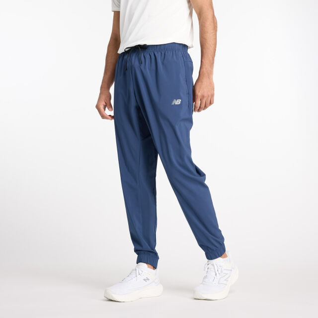 New Balance Sport Essentials Woven Jogger - miesten stretch-housut